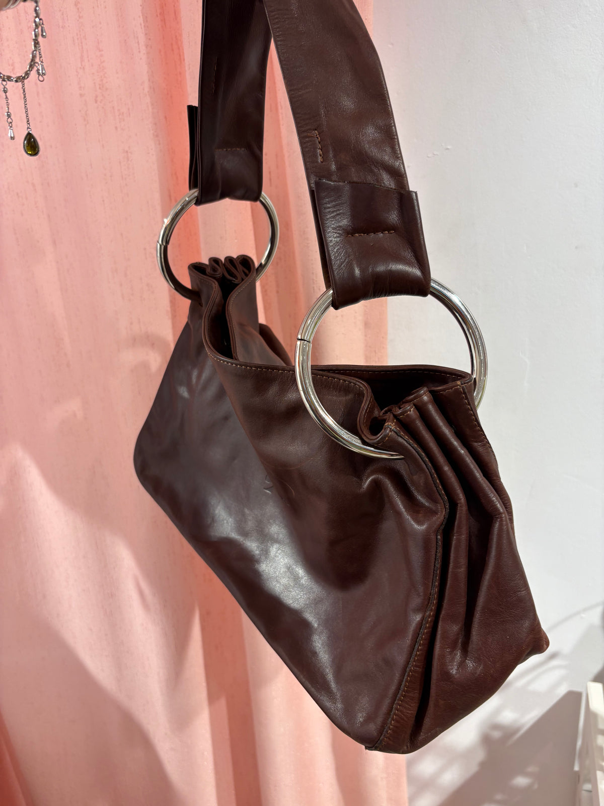 Incredible brown bag with huge circle hardware