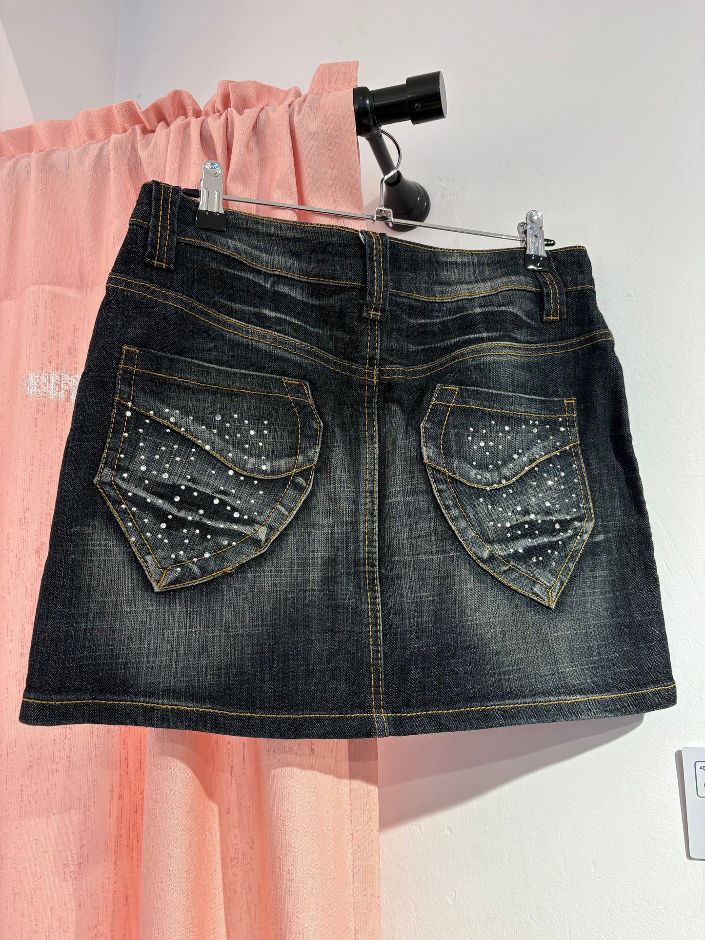 Denim mini skirt full of studs (L)