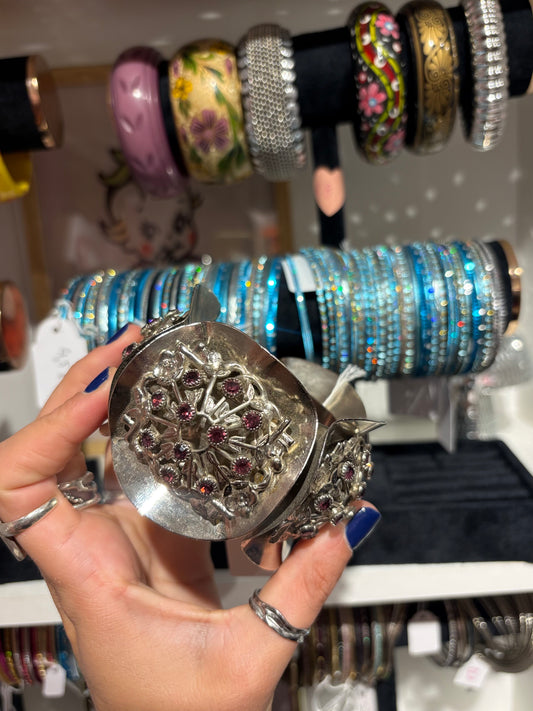 Incredible vintage bangle with purple stones