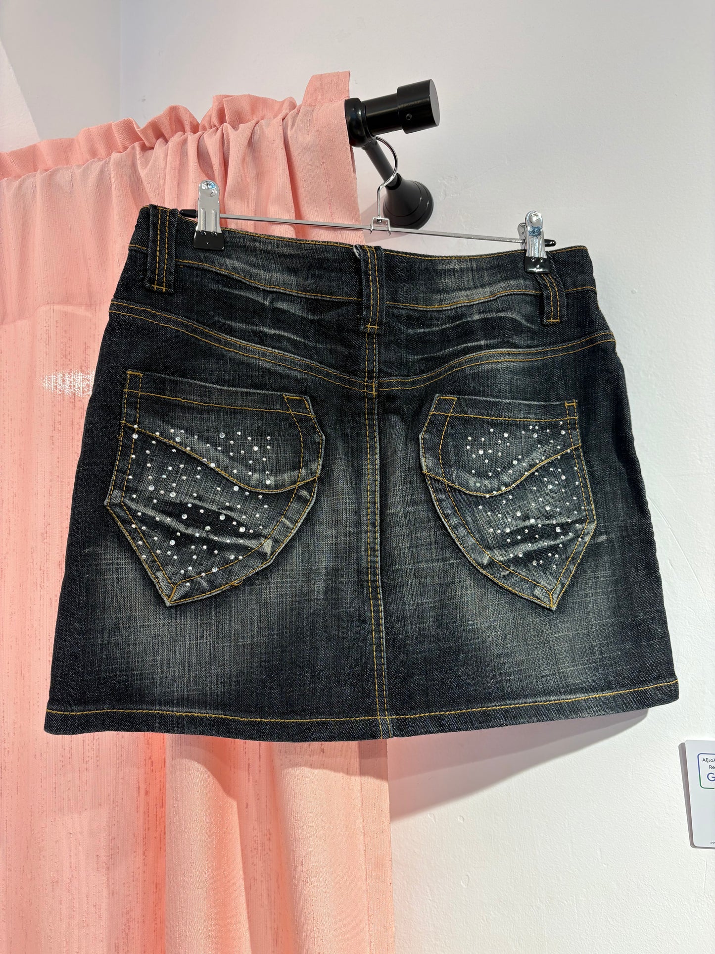 Denim mini skirt full of studs (L)
