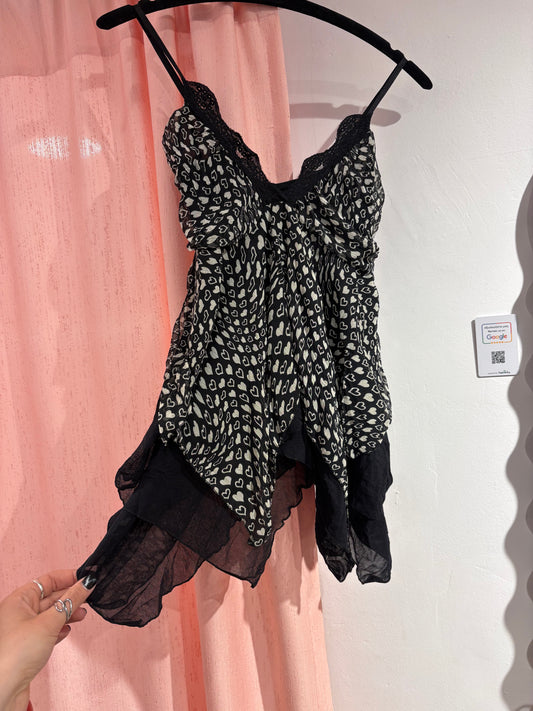 Sheer cami top with lace trim & a flowy asymmetrical hem (M)