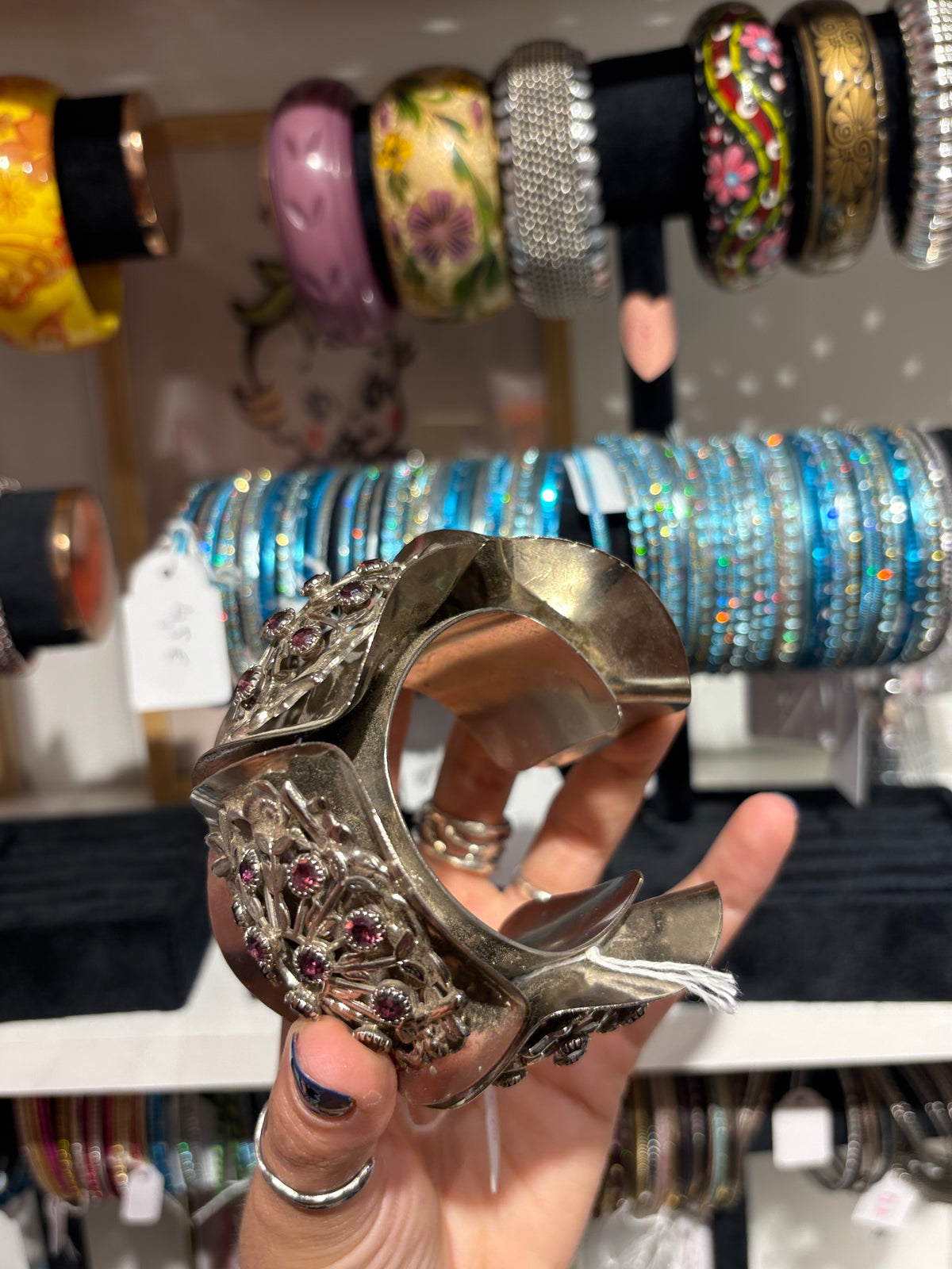 Incredible vintage bangle with purple stones