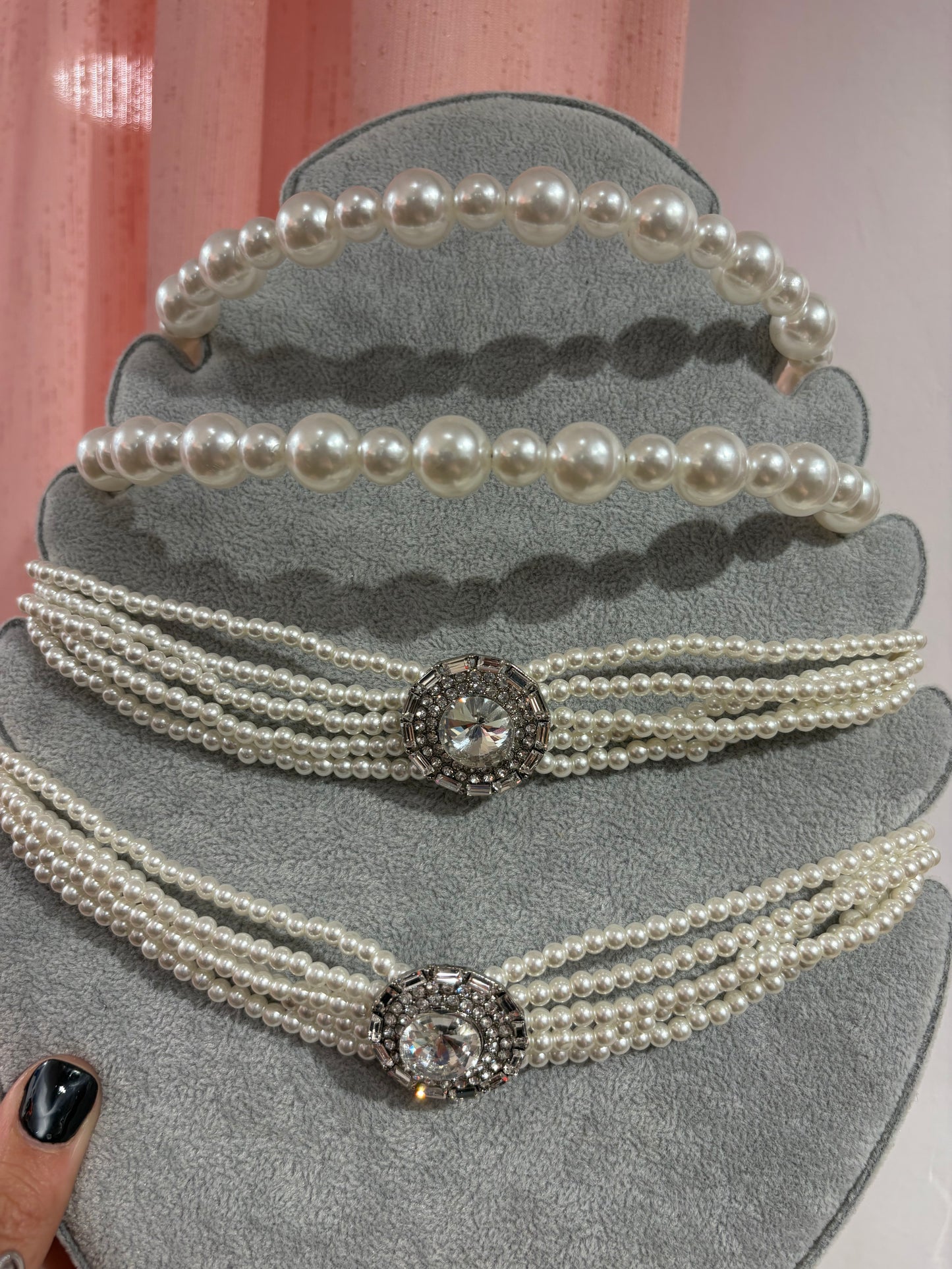 Statement multi-stand pearl chocker with a sparkling crystal centerpiece