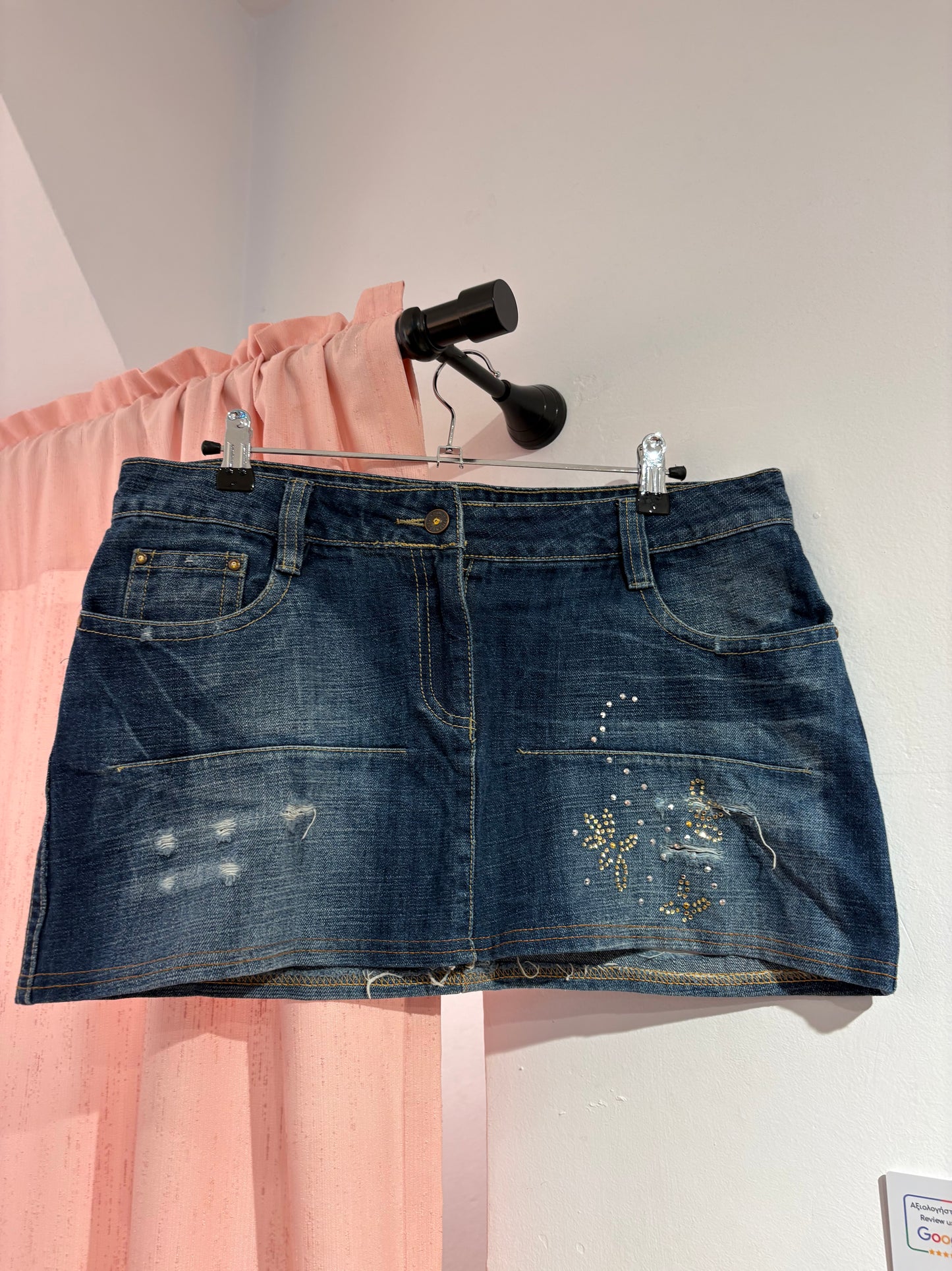 Cute ripped mini skirt with rhinestones (L)