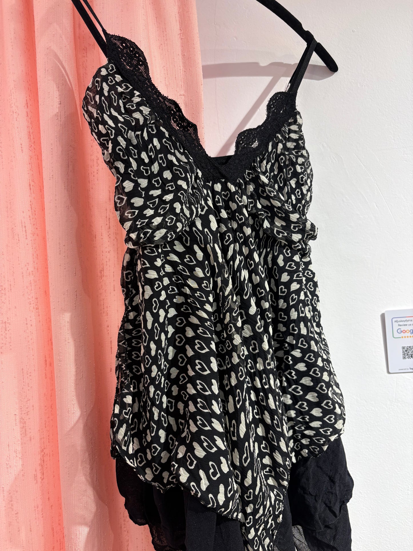 Sheer cami top with lace trim & a flowy asymmetrical hem (M)