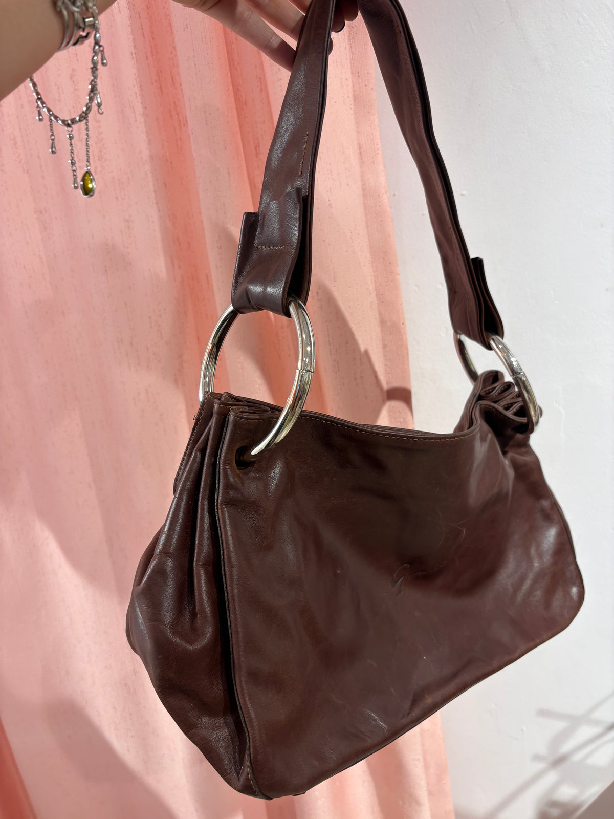 Incredible brown bag with huge circle hardware
