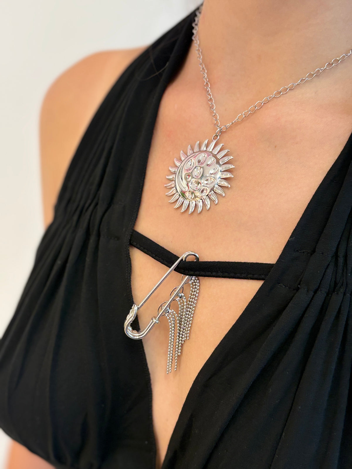 Stainless steel sun necklace