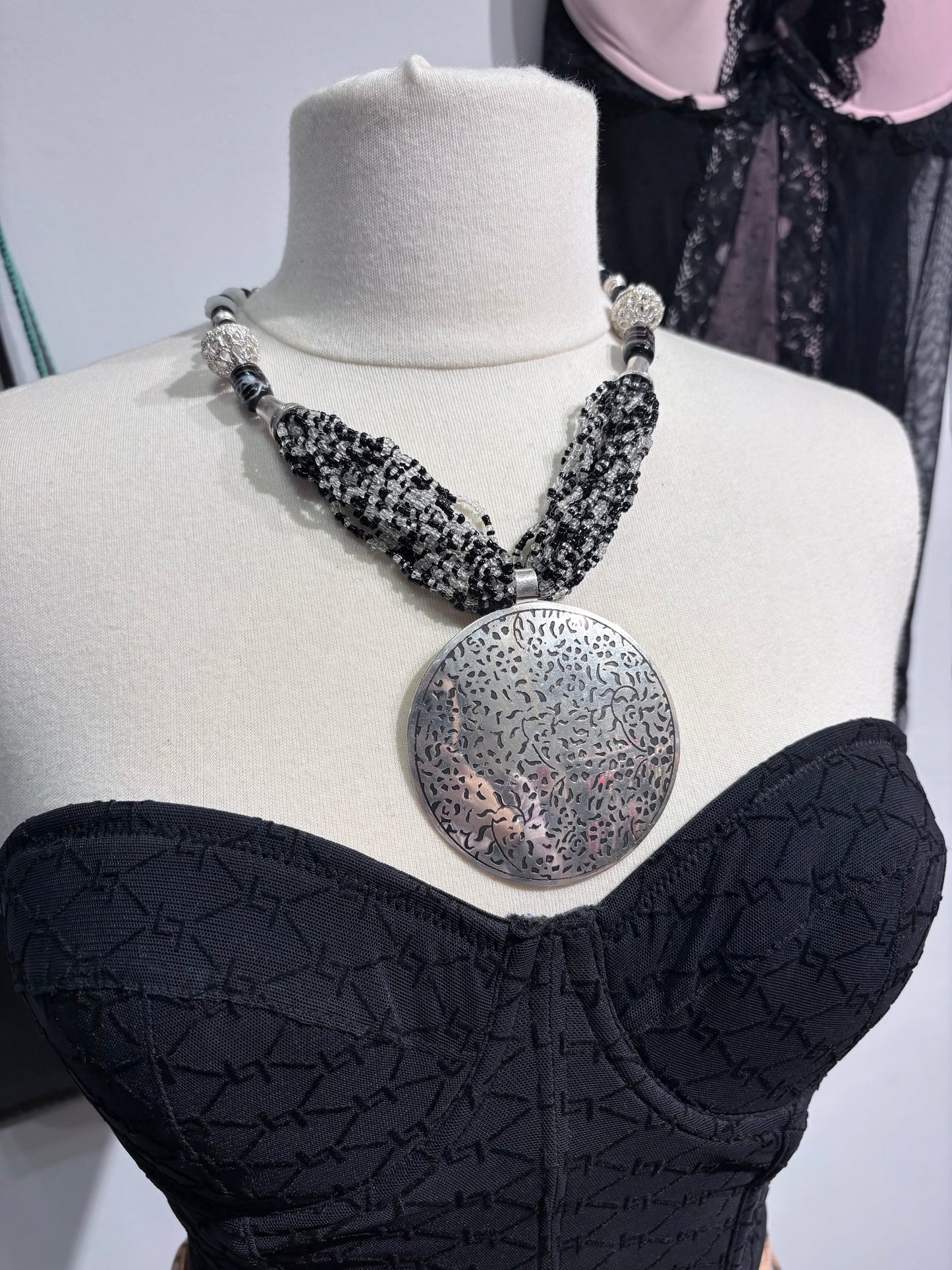 Vintage black necklace with large silver pendant