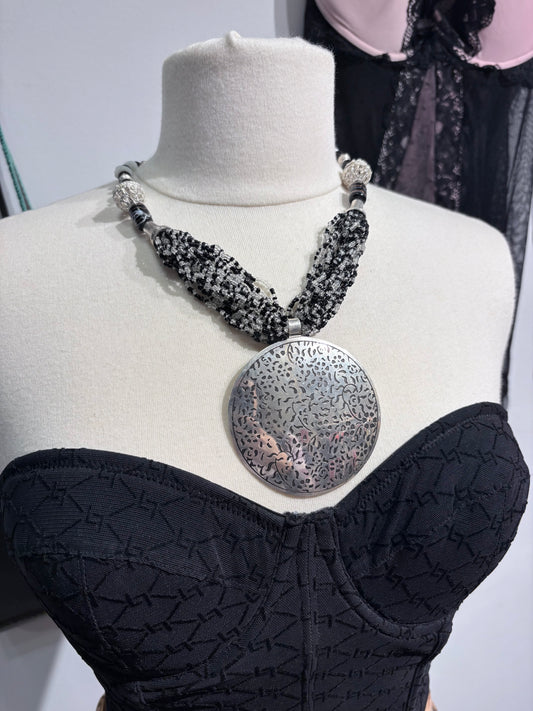 Vintage black necklace with large silver pendant