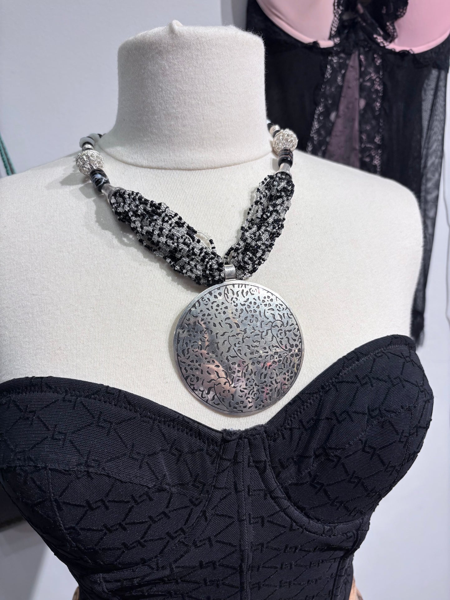 Vintage black necklace with large silver pendant