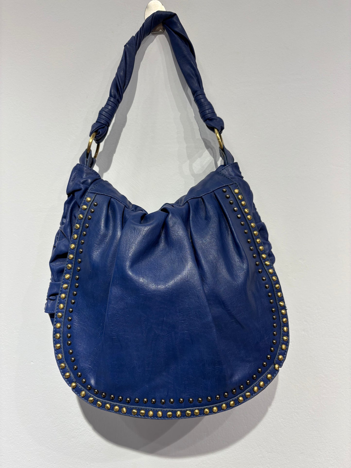 Electric blue bag with metal studs