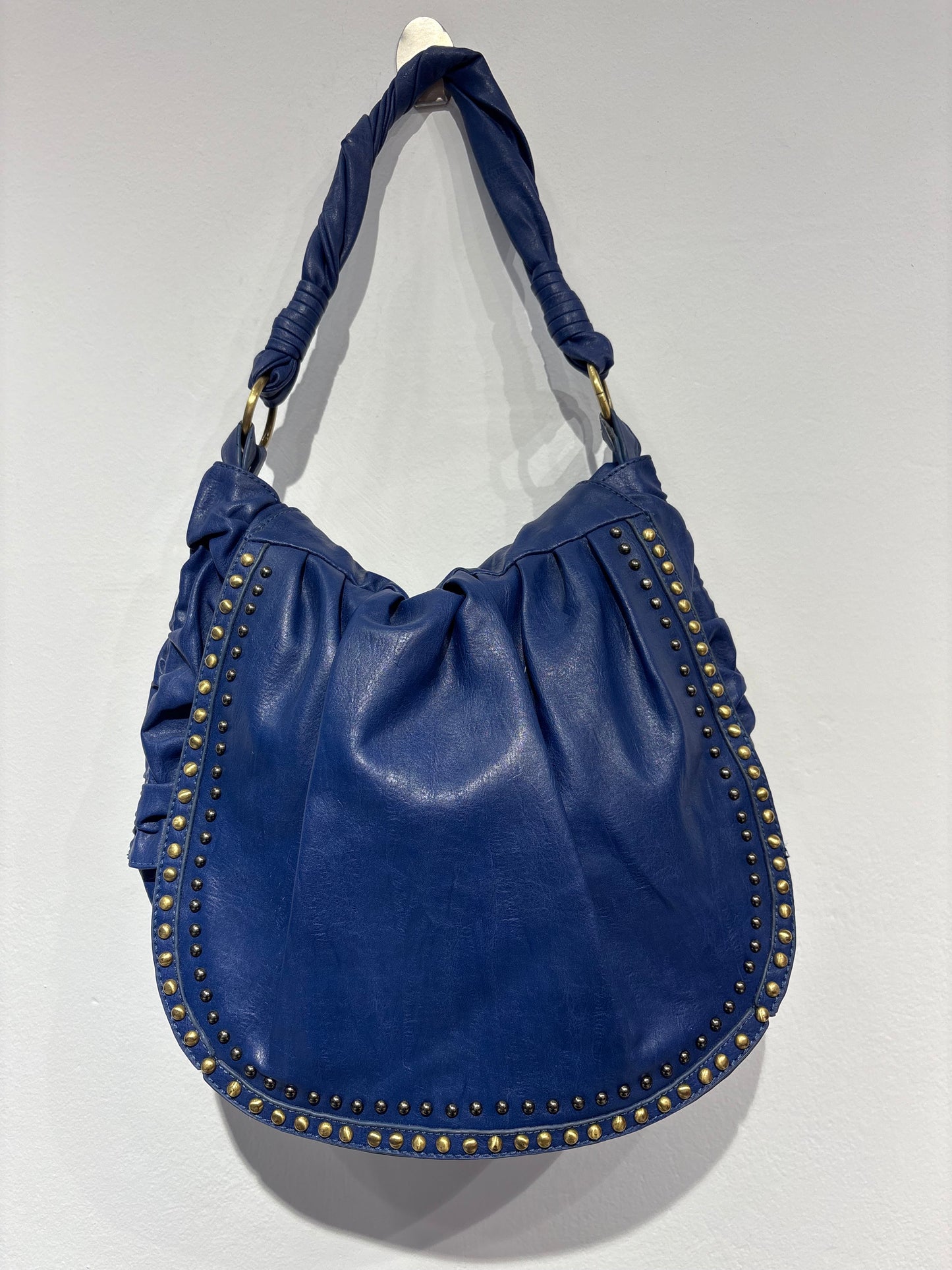 Electric blue bag with metal studs