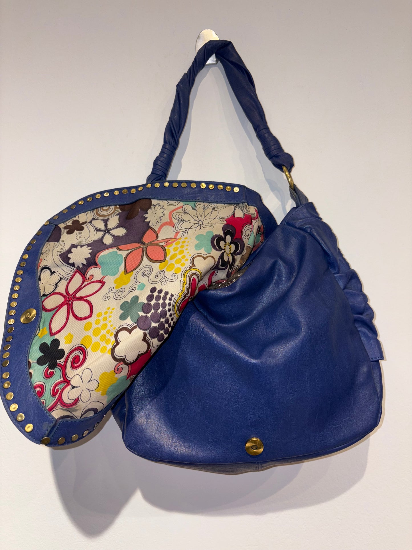 Electric blue bag with metal studs